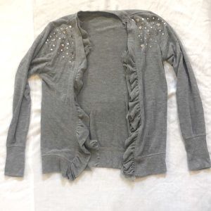 grey dressy cardigan with heart sequins on shoulders.